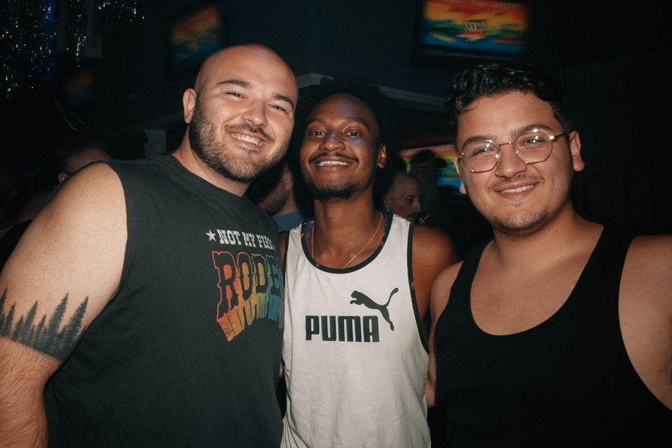 A group of young men in a club