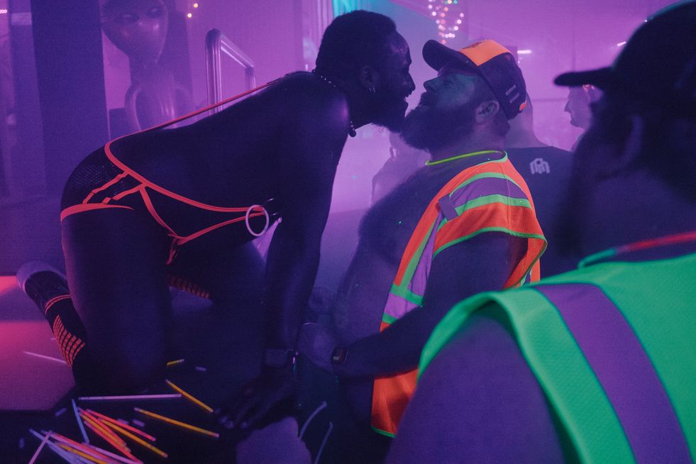 A go-go dancer dancing for a tipper