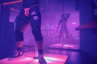 A go-go dancer performing on stage