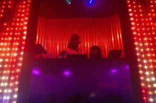 Sex On Decks (a wife and wife DJ duo) in the DJ booth
